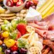 charcuterie-board-with-cold-cuts-fresh-fruits-cheese_53876-104565 charcuterie-board-with-cold-cuts-fresh-fruits-cheese_53876-104565