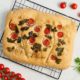 food-art-whole-focaccia-pizza-cut-flat-bread-with-vegetables-grid-tradition-italian-cuisine_73872-3575 food-art-whole-focaccia-pizza-cut-flat-bread-with-vegetables-grid-tradition-italian-cuisine_73872-3575